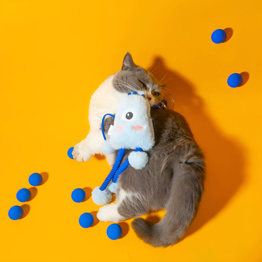 Blue telescopic elastic rope cat toy with plush and bell attachments on a white background.