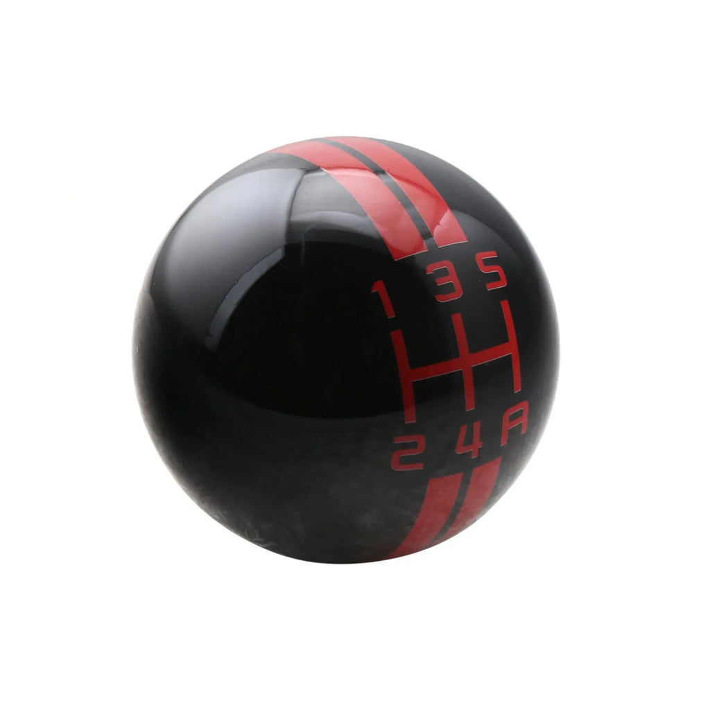 Black acrylic manual car gear shift knob with 5-speed and reverse markings, shown with three screw fittings.