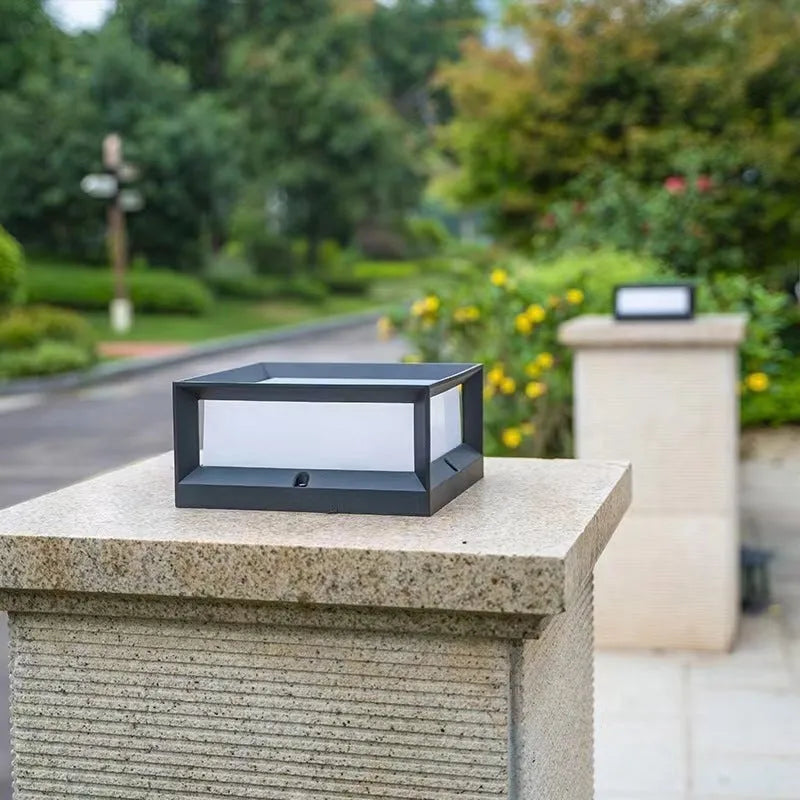 Solar-powered aluminium outdoor column light mounted on a wall, showing two size options for garden pathways.
