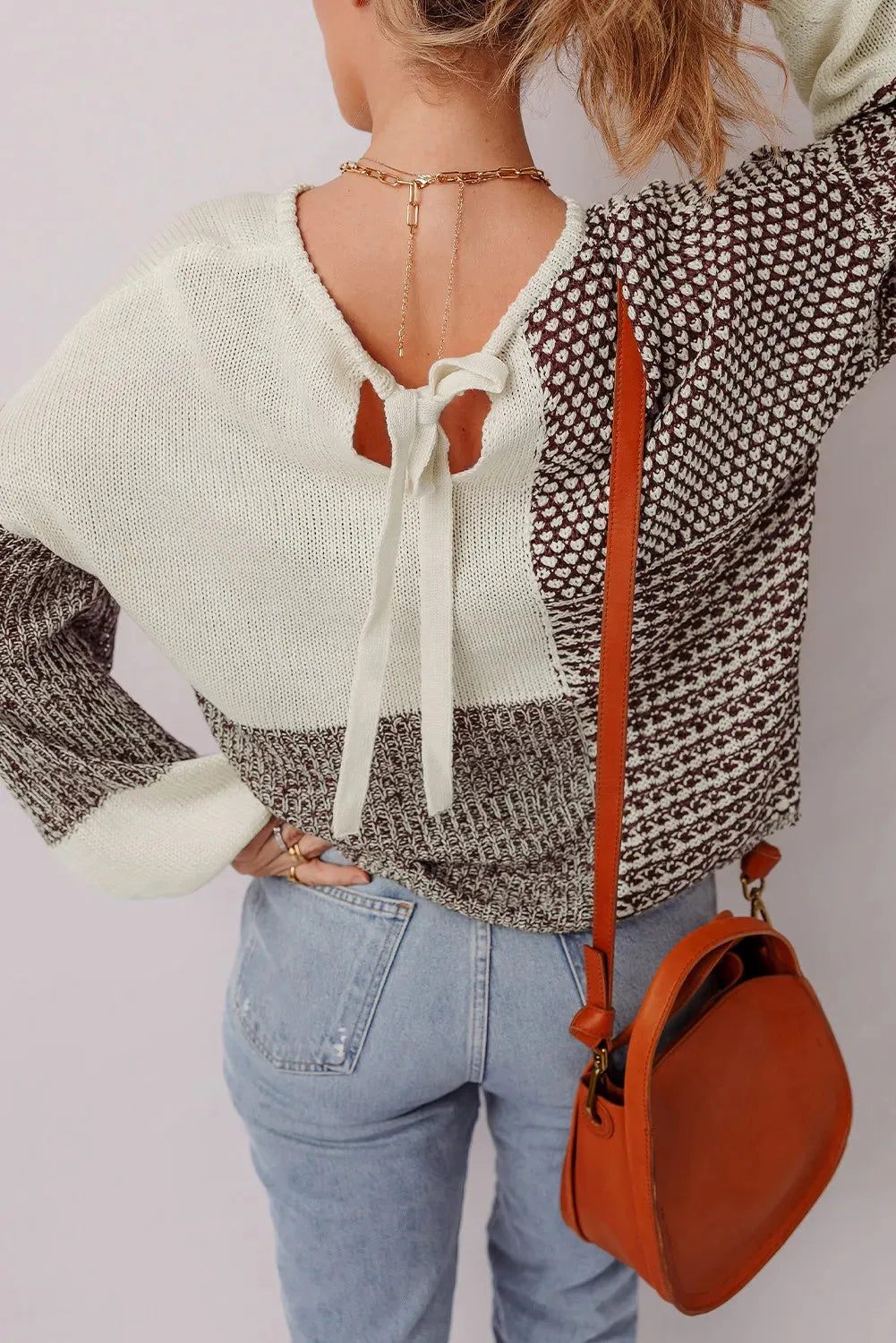 Dark khaki colour block loose sweater with back tie and drop shoulders.