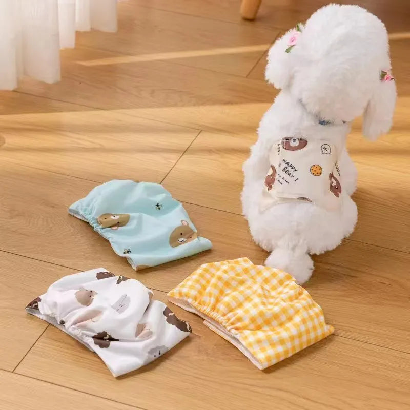 Reusable cartoon bone print dog diaper with fastener tape and elastic waistband, shown in blue bear pattern.