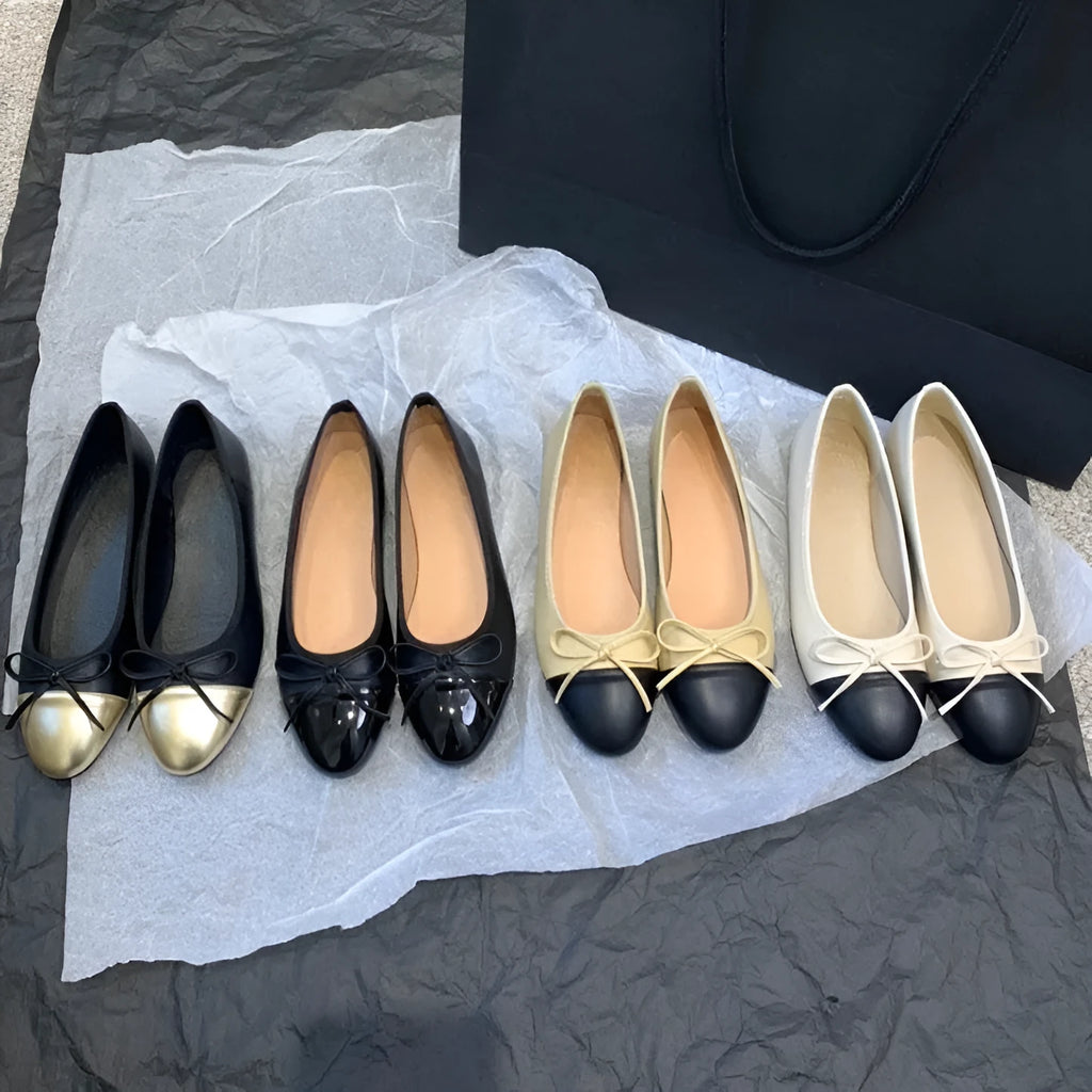 Women's apricot colour ballet flat pumps with a round toe and flat rubber sole.