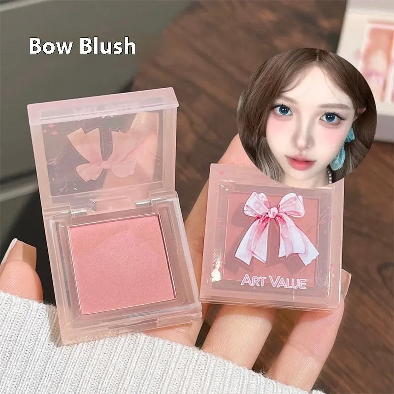 Butterfly Box makeup set showing four matte lip mud tubes and blush compact with chain necklace