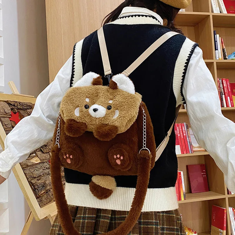 Coati plush cartoon backpack in brown with soft plush exterior and polyester lining, height 26cm, width 27cm