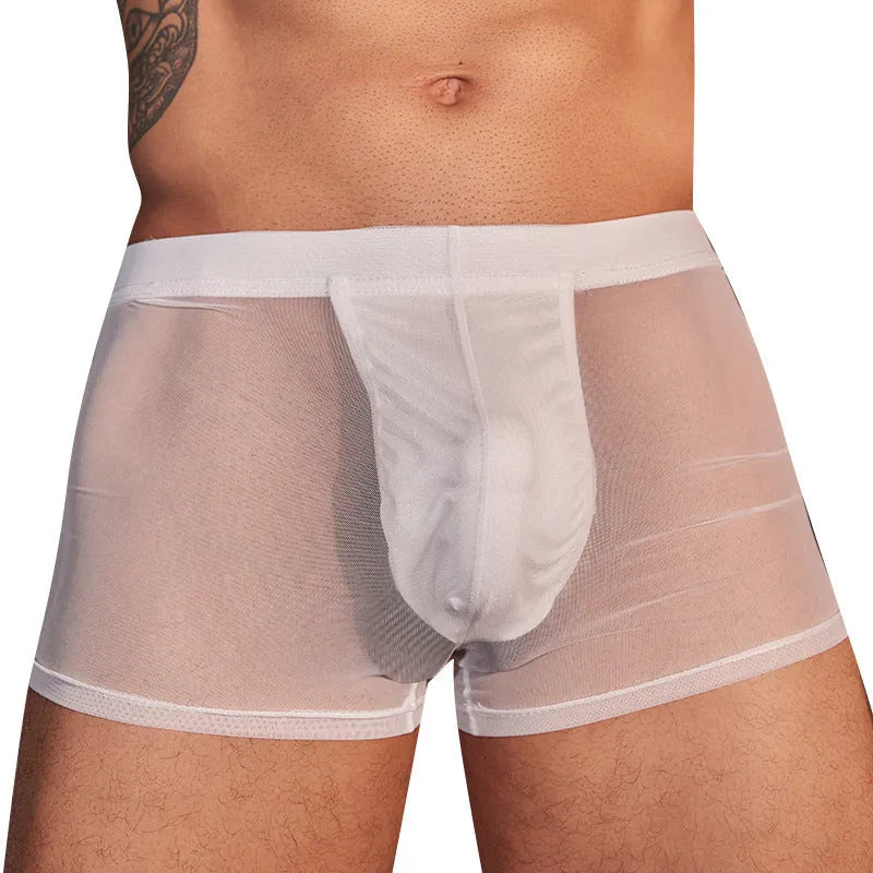 Men's black and white breathable nylon boxer briefs laid flat, showing ultra-thin fabric.