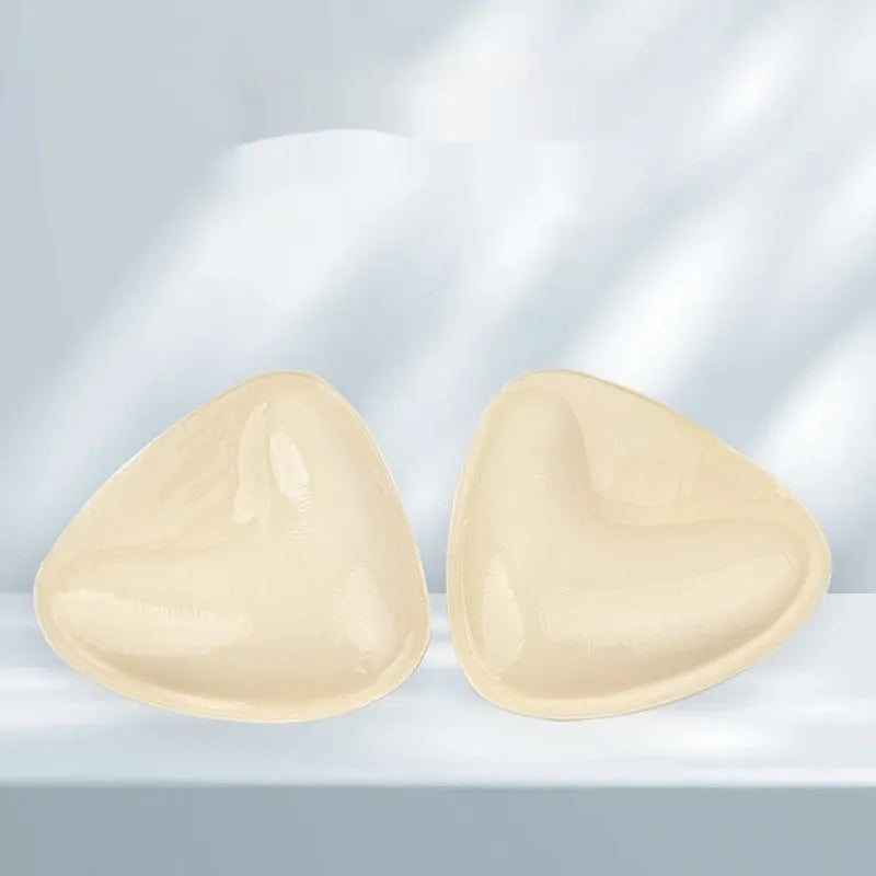 Double sided adhesive silicone bra inserts for push up lift in nude shades, reusable and water resistant