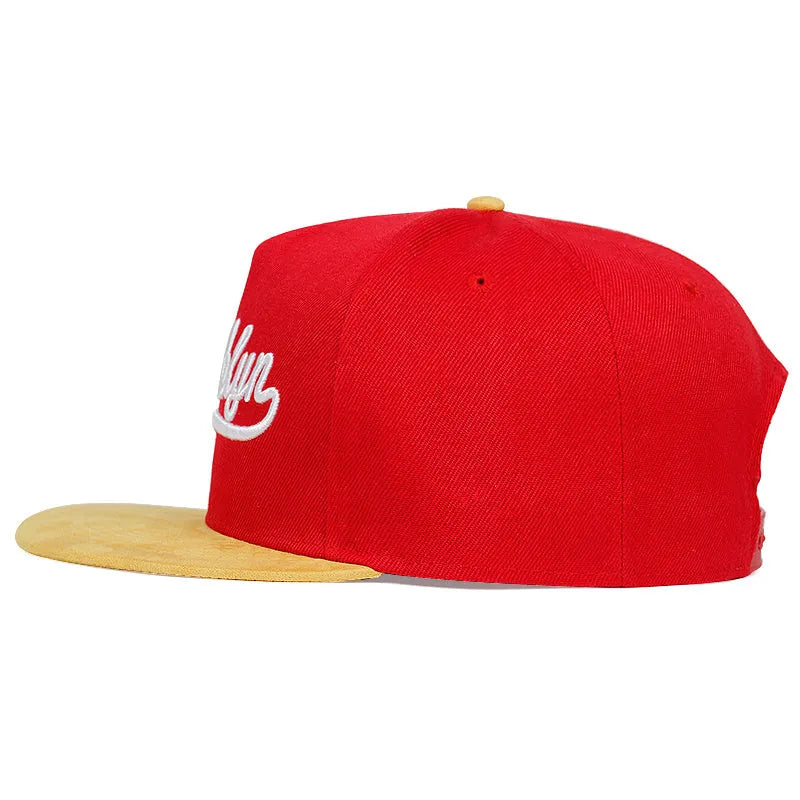 Red and black cotton adjustable baseball cap with embroidered letter pattern and short brim