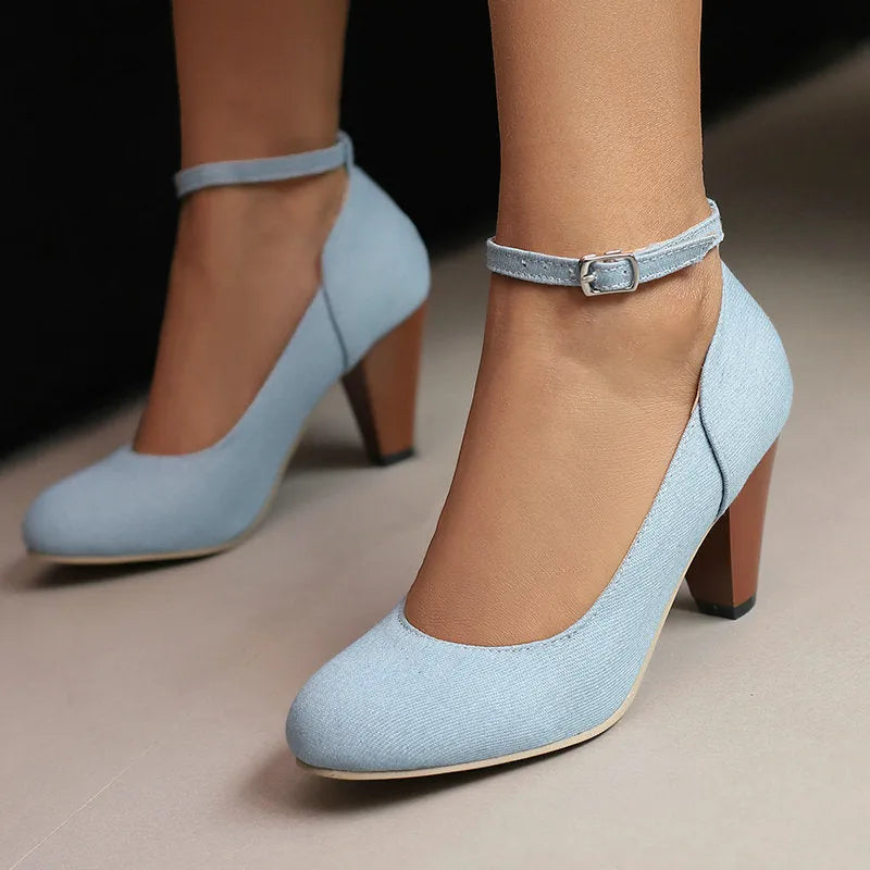 Blue denim women's high heel ankle boots with a buckle strap and thick waterproof platform sole.