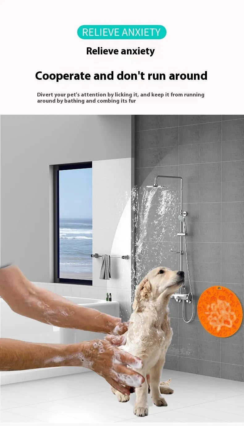 Round grey silicone pet lick mat with suction base on a kitchen floor