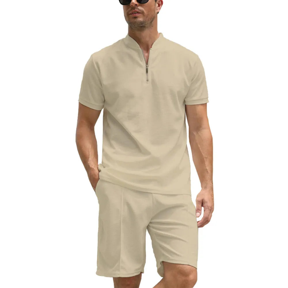 Men's solid colour short sleeve polo shirt and matching trousers two-piece set.