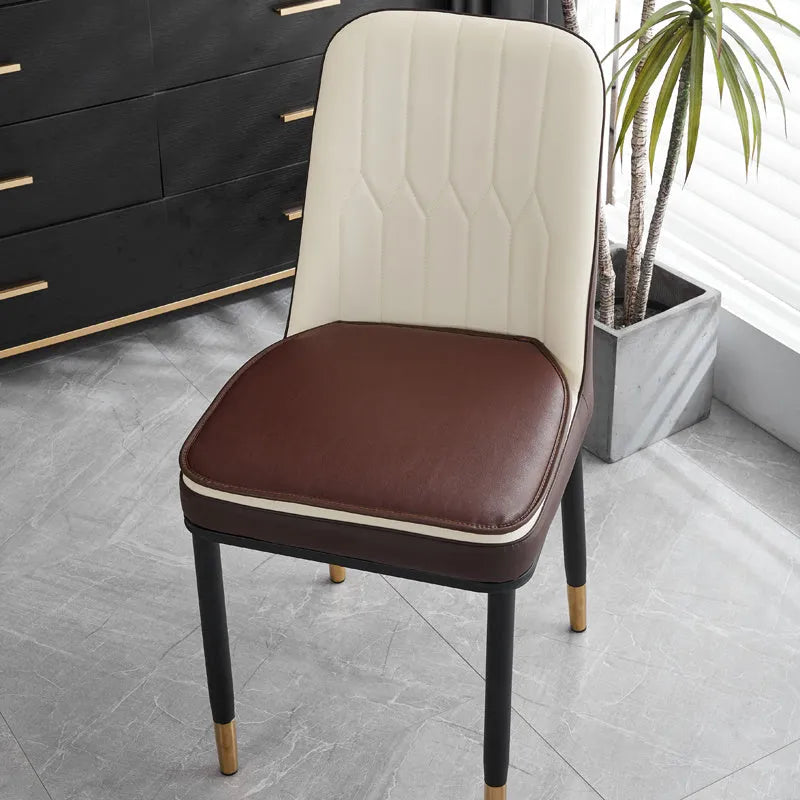 Leather horseshoe-shaped seat cushion with non-slip base in beige colour