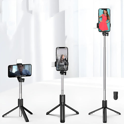 Black Bluetooth selfie stick with extended tripod legs and phone holder, shown with a smartphone attached.
