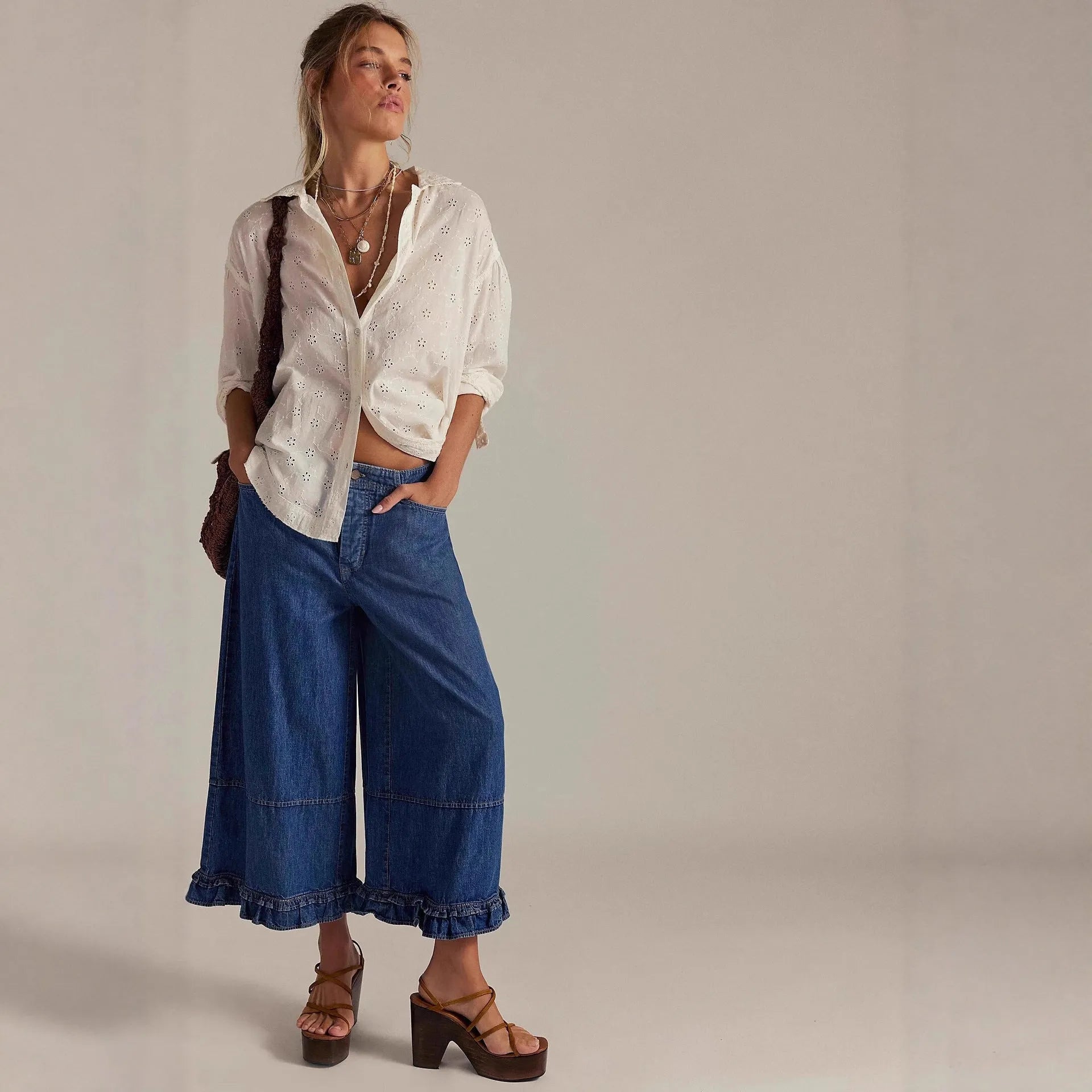 Women's wide-leg cropped lace jeans in dark blue, high waist, loose fit, with zipper and button details