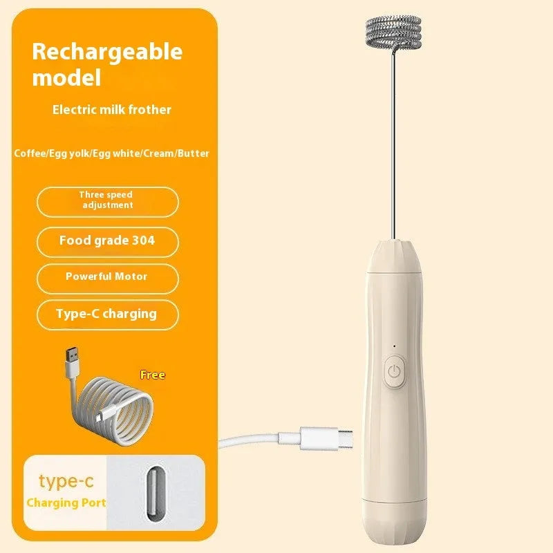 Mini handheld electric milk frother in black, white, and khaki colours with a stainless steel whisk.