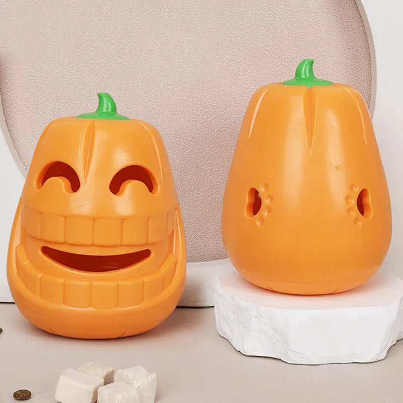 Halloween pumpkin shaped interactive dog chew toy with treat dispensing funnel
