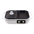 Green and white electric hot pot appliance with frying function on kitchen counter