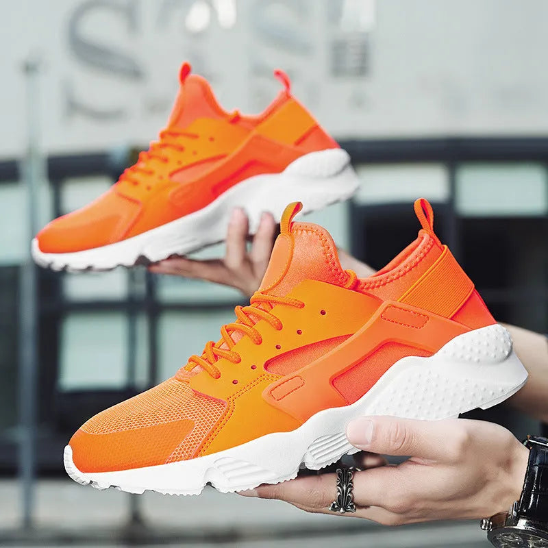 Men's low top mesh sneakers in fluorescent colours on a flat sole