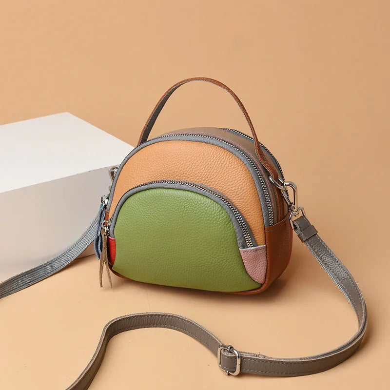 Hand-held crossbody first layer cowhide leather single-shoulder bag in soft round shape with sewing line detail