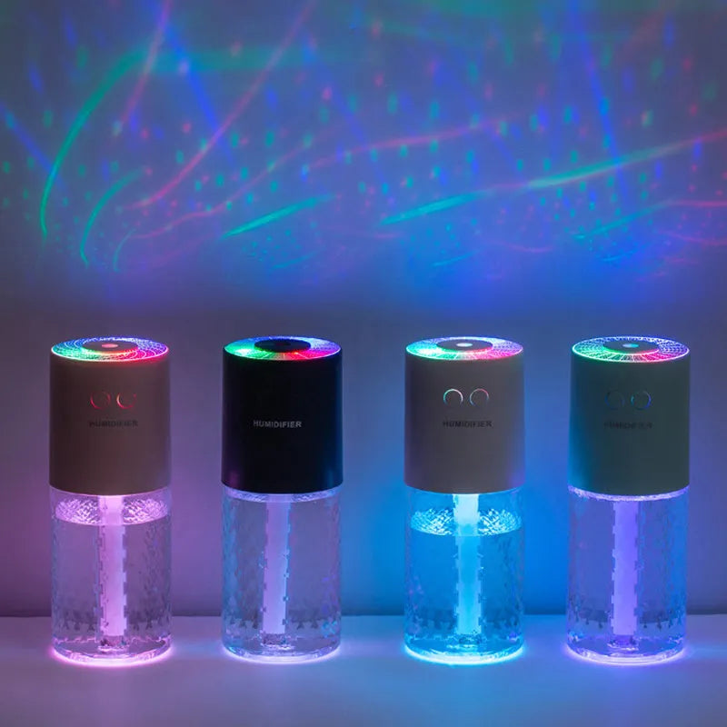 Wireless humidifier and projection lamp, mini portable USB car mist diffuser with 1 litre tank.