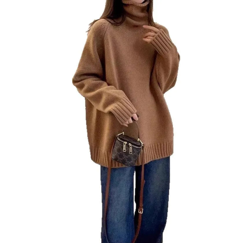 Women's thick grey turtleneck sweater with a textured curling pile collar, loose casual fit.