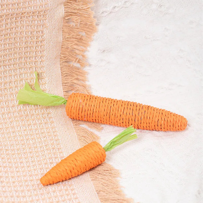 Bundle of cat toys including carrot chews, paper toys, ringing stones, sticks, and grinding sticks in S and L sizes.