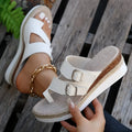 White patent leather women's wedge sandals with finger fit straps and woven detail, peep toe.