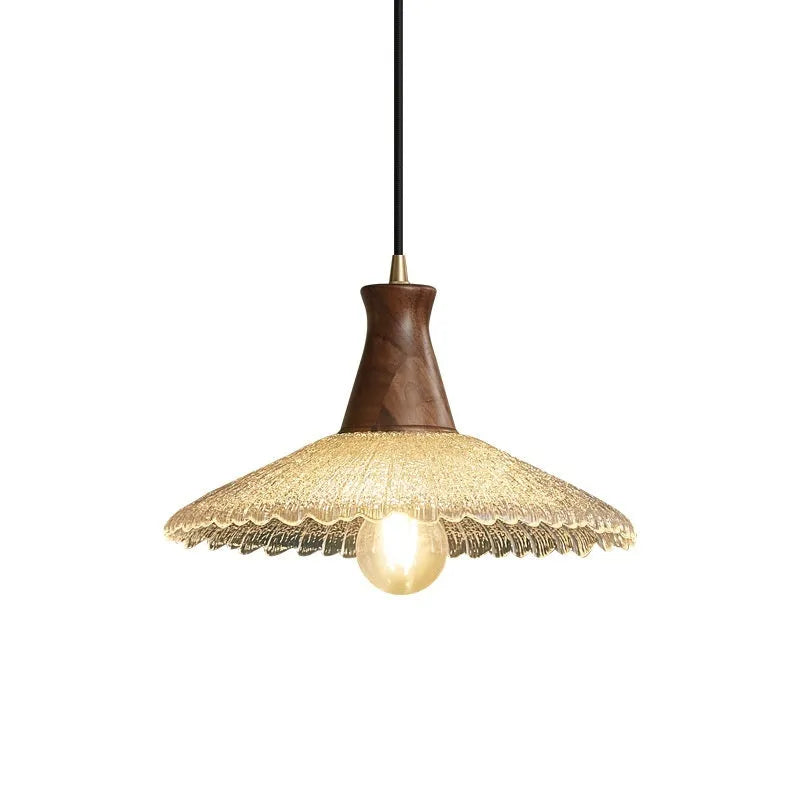 Brass-toned wood and glass chandelier with a retro design for ceiling mounting.