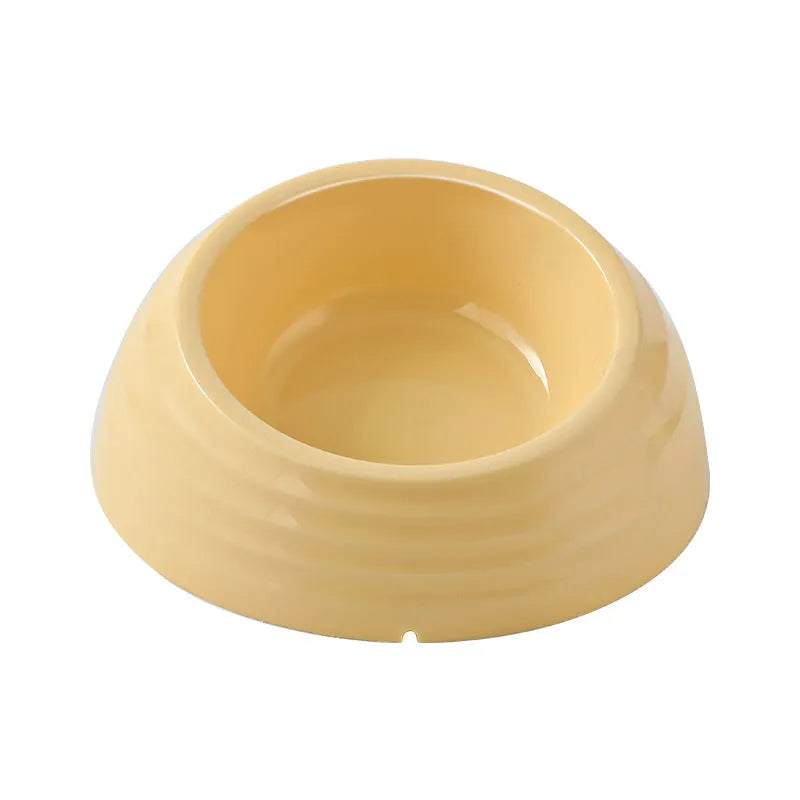 Stainless steel cat bowl with plastic non-slip base in a choice of beige, brown, or light green colours.