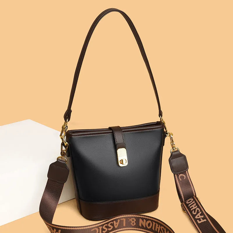 Korean-style soft PU bucket bag with dual shoulder straps in black or brown colour