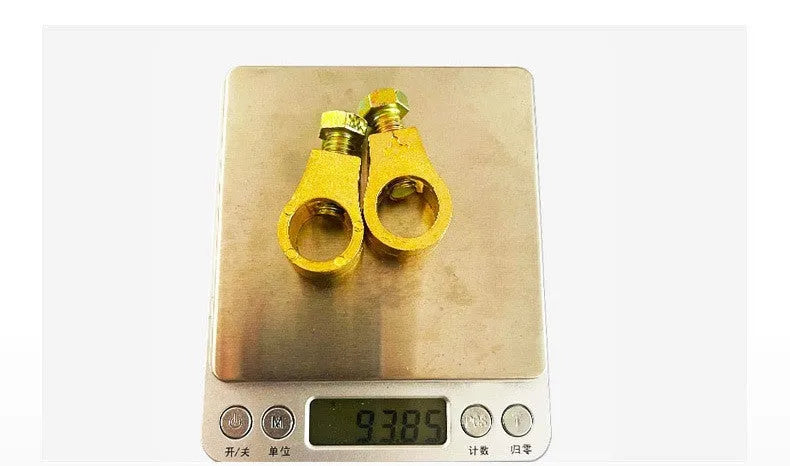 Solid copper battery terminal clamp with patented fastening clip for car battery connections.