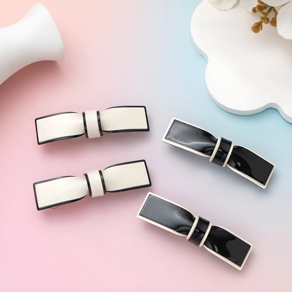 Acrylic bow hairpin pair in black and white, 6.5cm length, classic style for women's hair