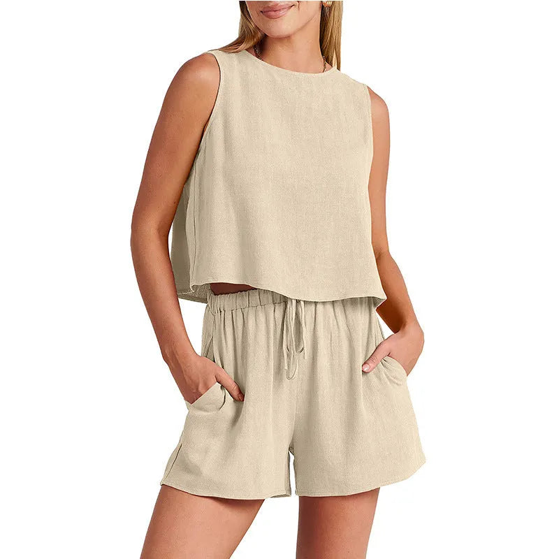 Women's apricot colour summer set with sleeveless top and drawstring shorts on a hanger.