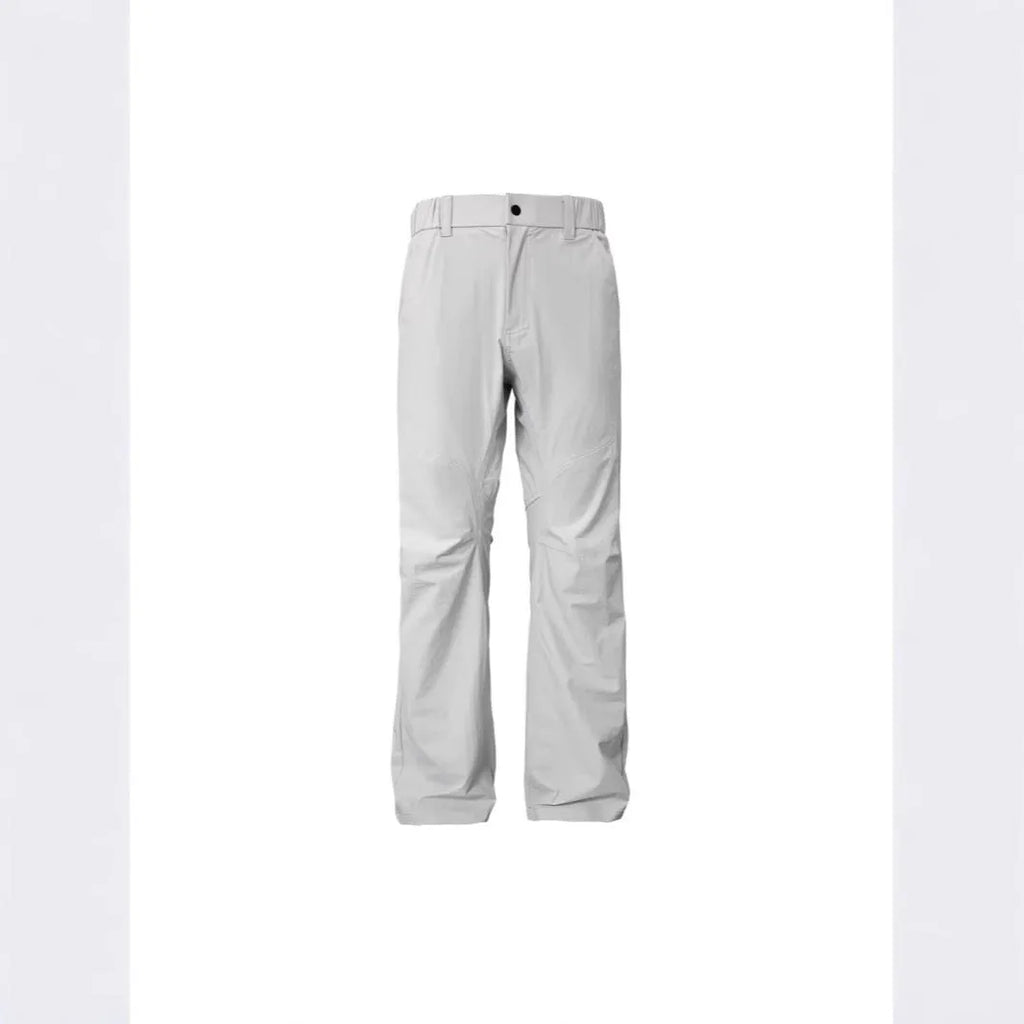 Man wearing grey 3D cut deconstructed casual trousers with a straight leg and elasticated waist.