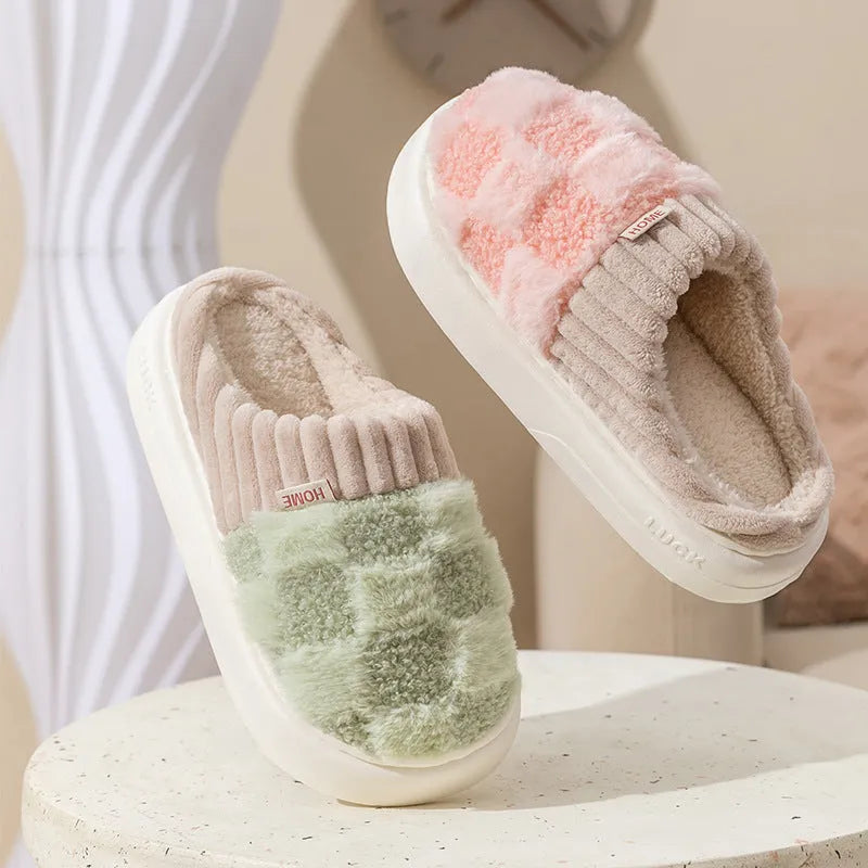 Women's plush round-toe slippers in grey, showing car suture detail and a flat PVC sole.