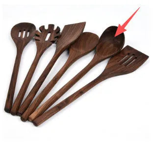 Six-piece black walnut wooden kitchen utensil set with spoon, spatula, slotted spoon and spaghetti claws