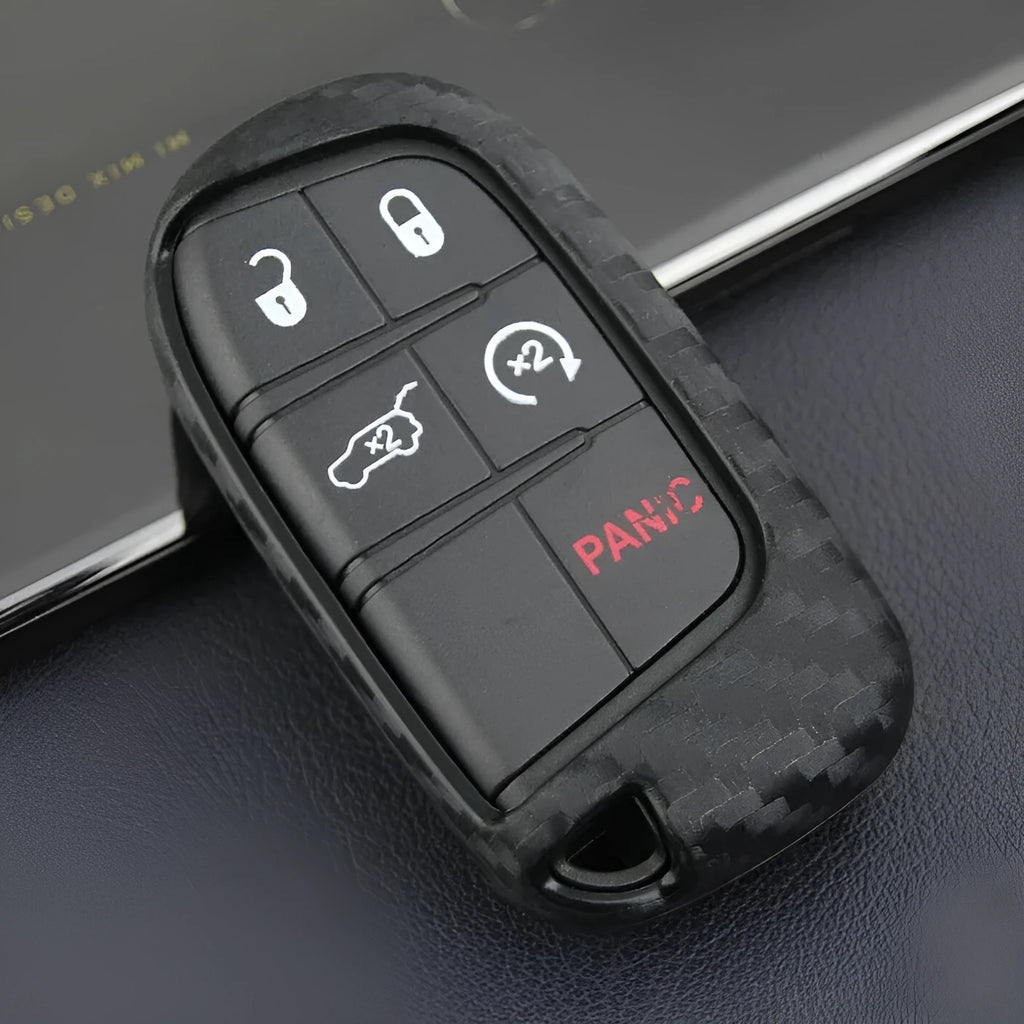 Carbon fibre pattern silicone protective case covering a Dodge, Chrysler, and Fiat car key fob