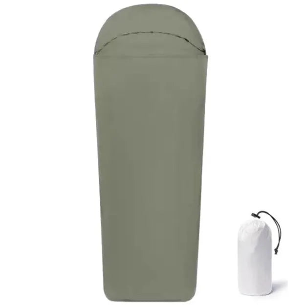 Blue mummy-style nylon sleeping bag unrolled, showing tapered design and matt fabric texture.