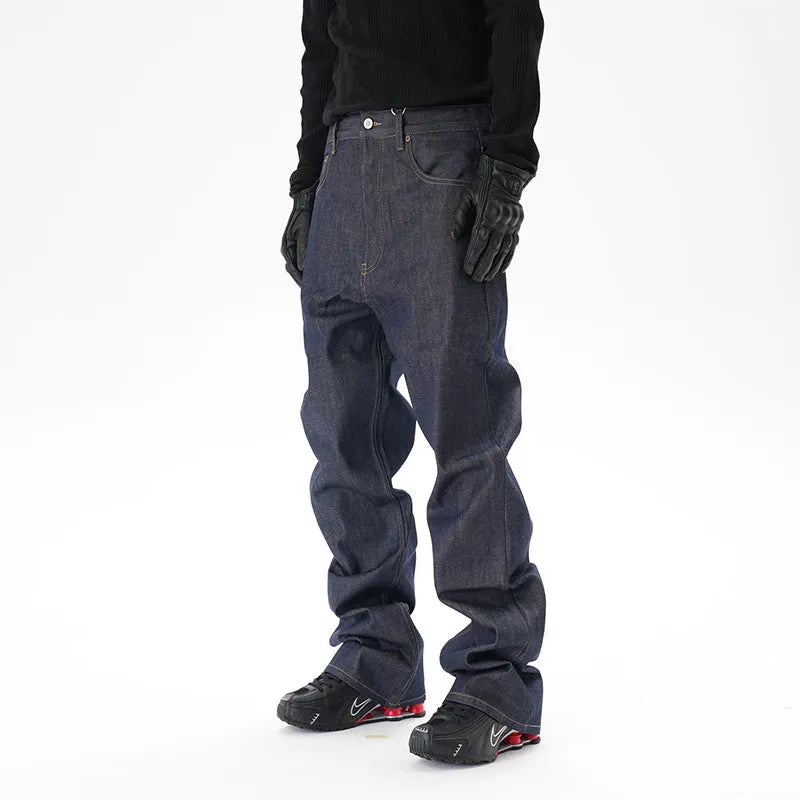 Man's dark blue loose straight-leg casual jeans on a white background.