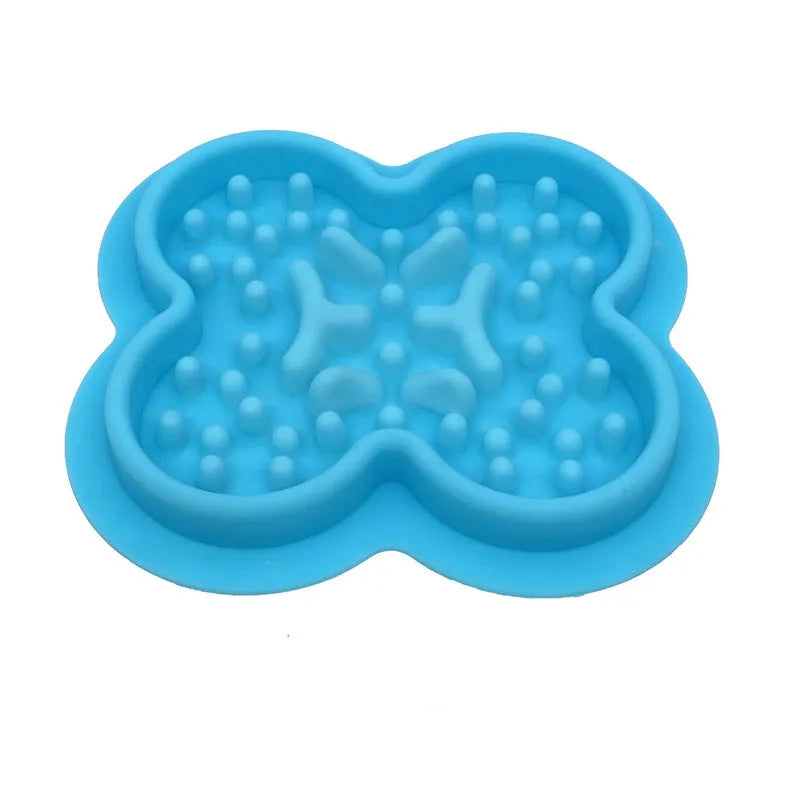 Silicone pet licking pad slow feeder mat in green colour with textured surface, showing scale.