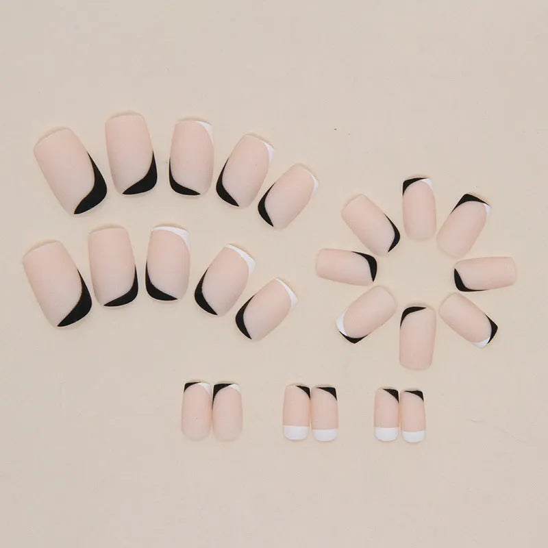 Black and white frosted reusable gel nail manicure set with 22 pieces.
