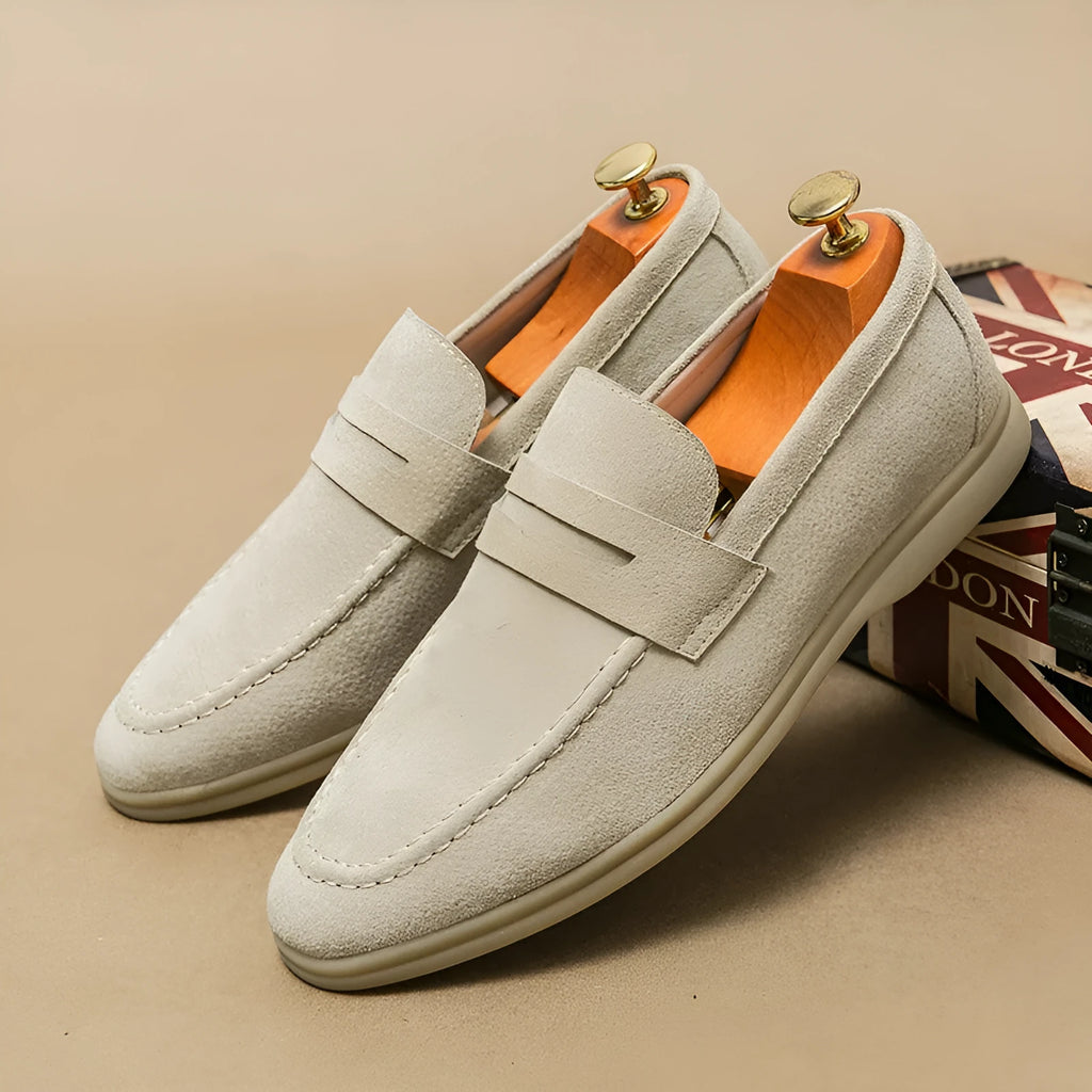 Men's black leather slip-on casual shoes with a round toe and rubber sole