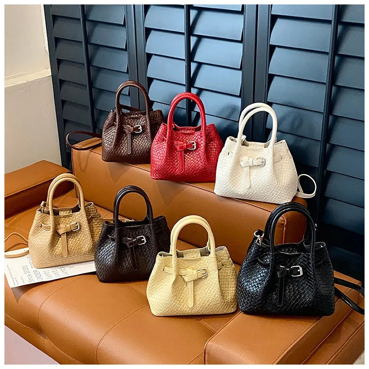 Soft PU bucket messenger handbag for women with spliced exterior and outer pocket, black colour option