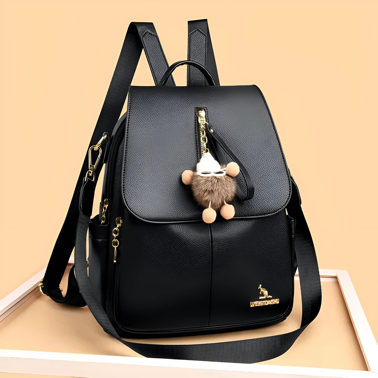 Genuine leather backpack with pendant and spliced belt detail for students and travellers, available in beige
