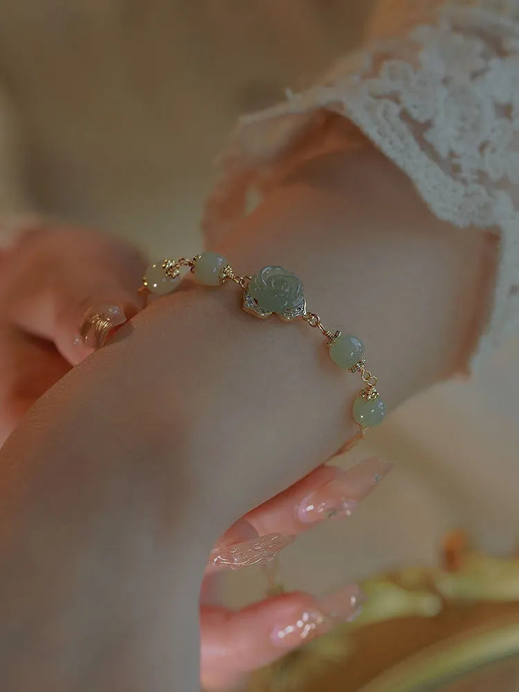 Original national-style women's bracelet with Hetian jade rose motifs and 14K gilded accents