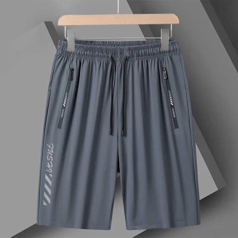 Men's quick-drying nylon sports shorts in loose fit with medium elastic waistband