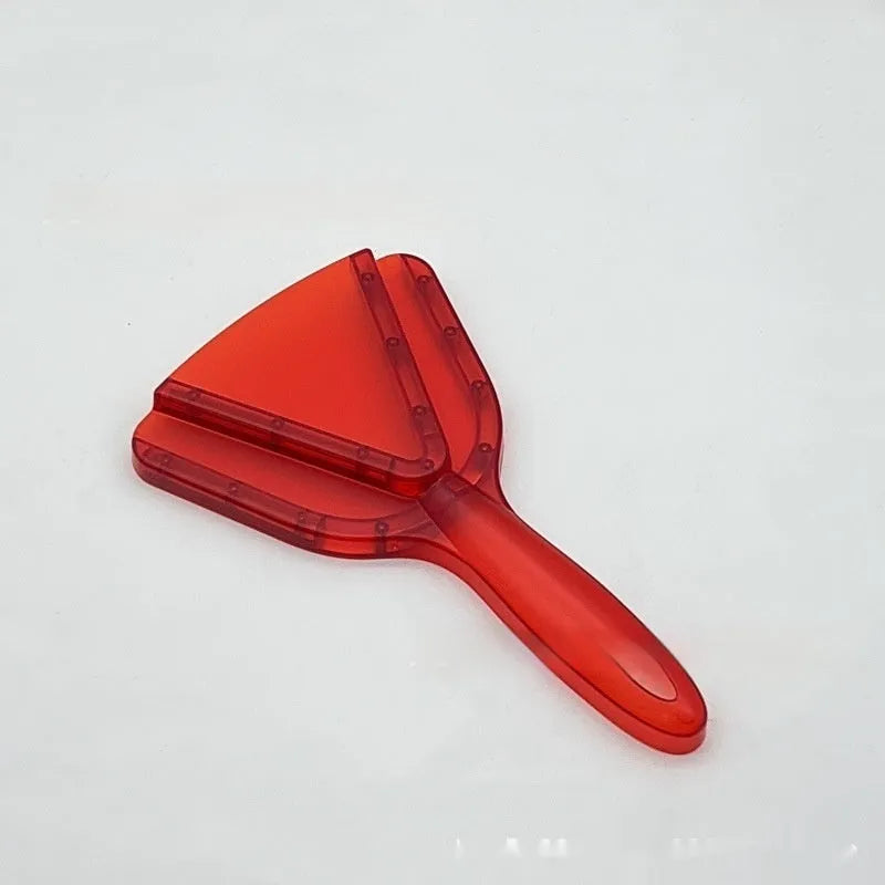 Red adjustable telescopic can and bottle opener with non-slip handle on a kitchen counter.