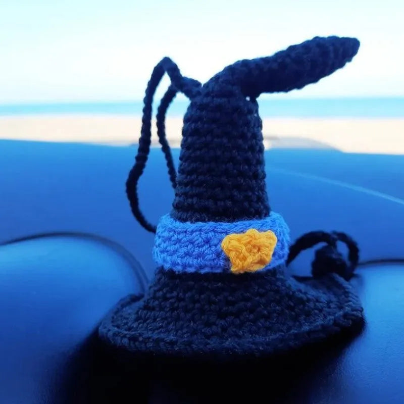 Plush hand-woven car hanging ornament in a cartoon design, made from soft polyester fabric.