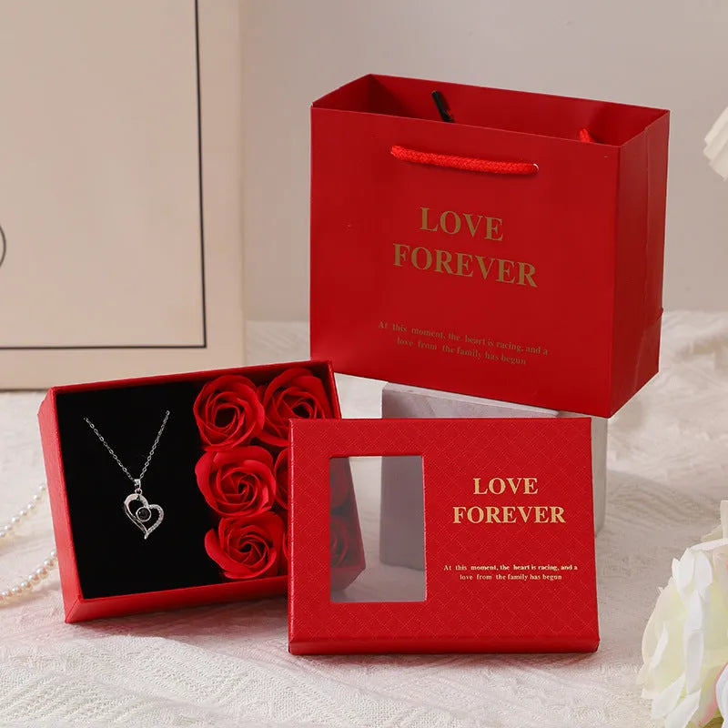 Red soap flower gift set with six roses in a box and matching handbag, Korean style decoration.