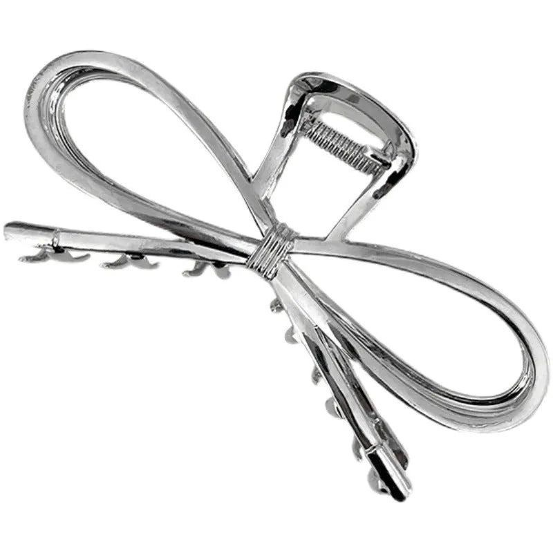 Korean style alloy bow barrette hair clip in gold or silver finish for women