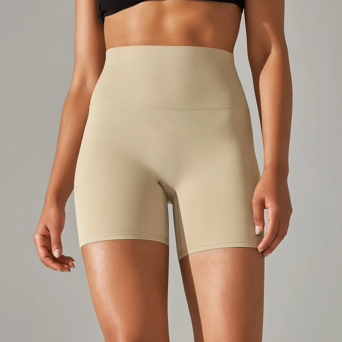 Women's high waist fitness tights in dark green colour with belly contracting design and hip lift construction